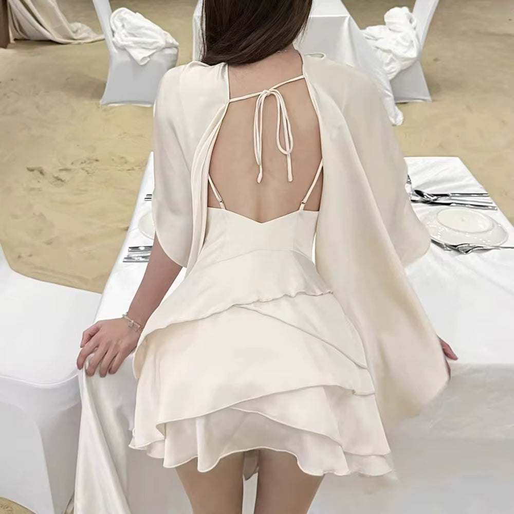 Elegant Solid Round Neck Sleeveless Patchwork Lace Up Irregular Mini Dress