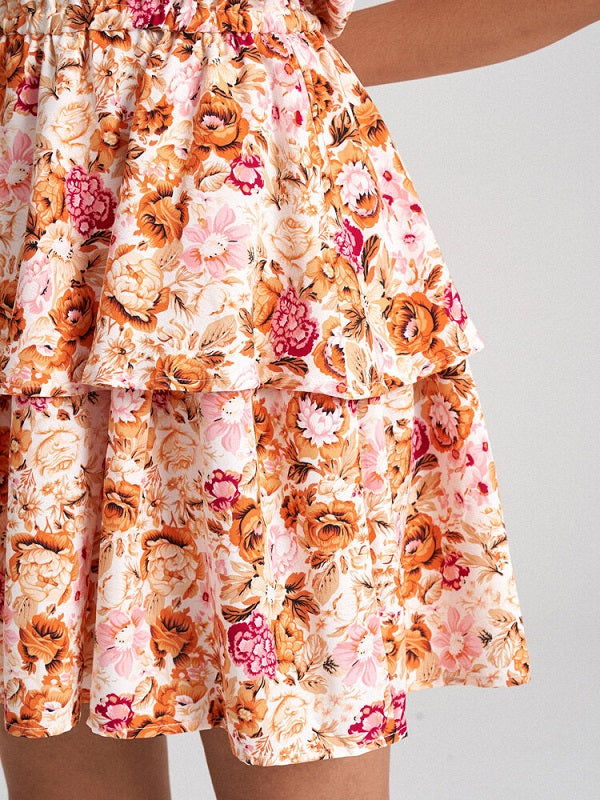 Flower Print Open Back Self Tie Halter Tiered Mini Dress